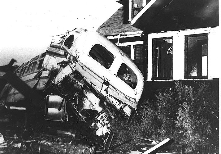 Damaged bus from Suburban Transit Co near 94th St and Menard