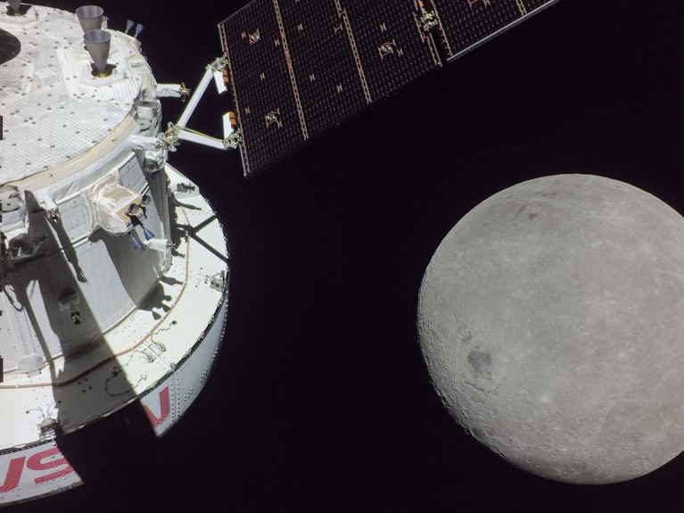 A portion of the Moon looms large just beyond the Orion spacecraft in this image taken on the sixth day of the Artemis I mission by a camera on the tip of one of Orion’s solar arrays.