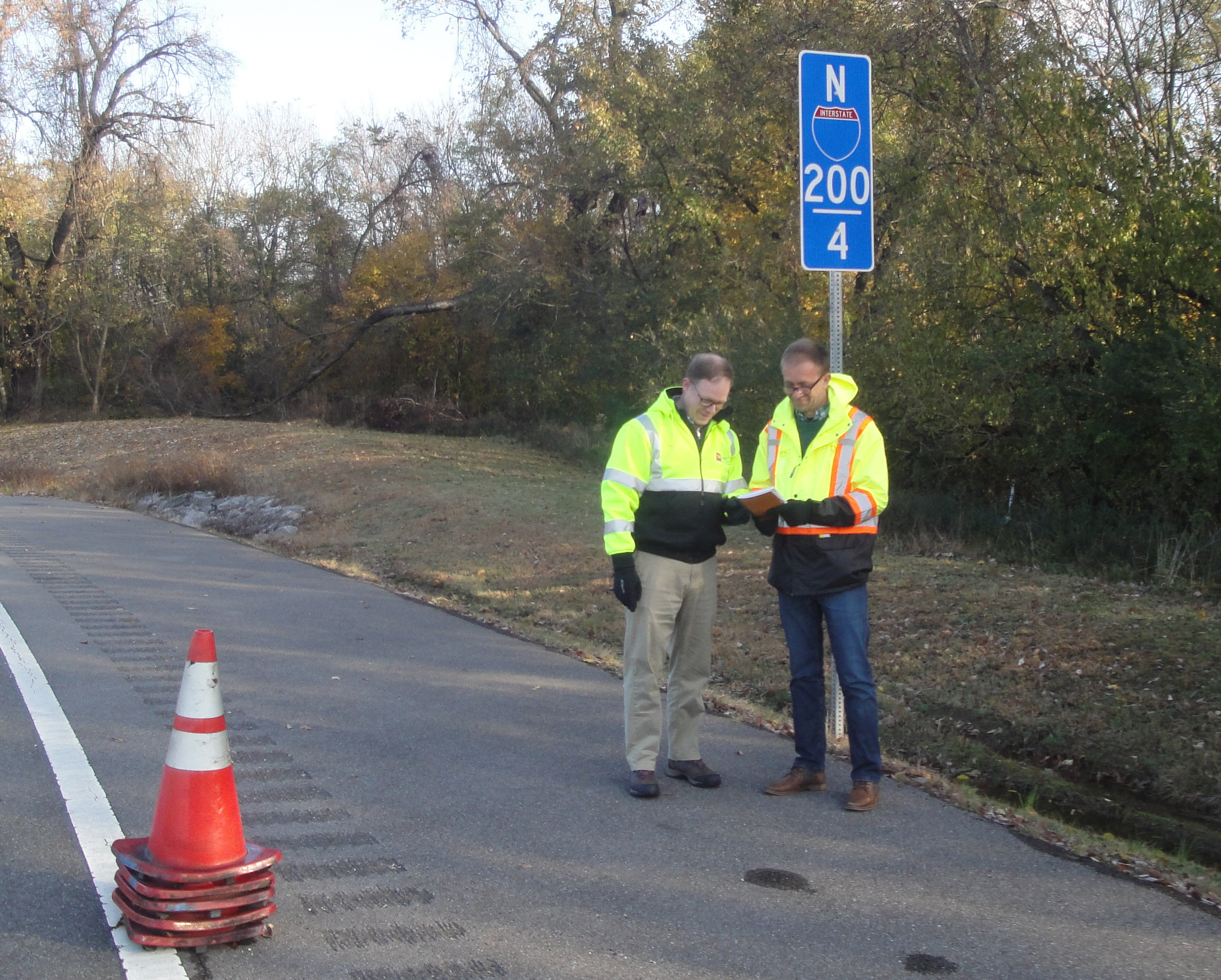 Matt Cate and Airton Kohls checking setup with the MUTCD