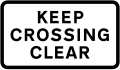 Supplementary plate warning drivers to not block the level crossing