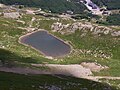 Veduta del Lago Piatto alle pendici dell'Alpe Tre Potenze (Val di Luce, PT)