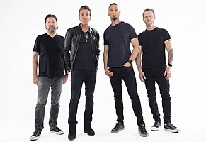 Creed in 2023. From left to right: Scott Phillips, Scott Stapp, Mark Tremonti, and Brian Marshall.