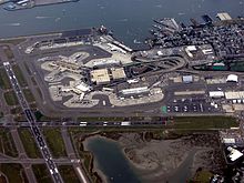 Aerial view of Logan Airport with Boston Harbor on the top of the image