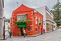 Conspicuous corner tavern with balcony