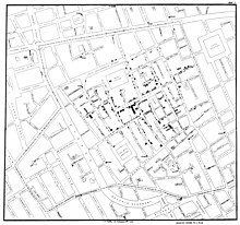 A black and white map John Snow's cholera map of the 1854 Broad Street cholera outbreak, with houses of infected people marked in black.