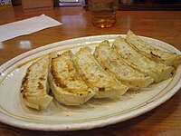 A plate of fried dumplings (gyōza)