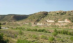 The reclaimed Uravan townsite (at the base of sandstone outcrop) as it appeared in 2008