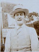 Man wearing a Panama hat and buttoned waistcoat, 1927.