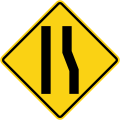 Road narrows on right side