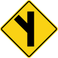 Skewed side road junction on left