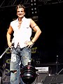 Image 123English-Australian singer Peter Andre in 2004 wearing ripped and sandblasted baggy jeans influenced by surfer and hip-hop fashion. (from 2000s in fashion)