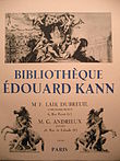 Page de titre d'un catalogue de vente aux enchères publiques d'une collection de livres anciens avec nom du commissaire-priseur et de l'expert. La page est décorée de motifs à angelots et chevaux.