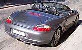 Porsche Boxster circa 2004, with detachable clear plastic windblocker and a Z-fold top, automatically raiseable in 12 seconds[48] and optional 51 lb (23 kg) detachable aluminum hardtop (not shown)