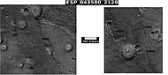 Cones along with a band of material of unknown origin. Picture taken with HiRISE under HiWish program. Arrows point to the edge of bands.