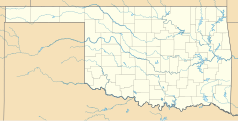 Mapa konturowa Oklahomy, blisko centrum na prawo u góry znajduje się punkt z opisem „Cimarron City”