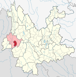 Location of Shidian County (red) and Baoshan City (pink) within Yunnan