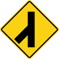 Skewed side road junction on left