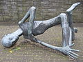 Image 7The sculpture „Der sterbende Häftling“ (The Dying Prisoner) at the memorial site of the Neuengamme concentration camp. The camp operated from 1938 to 1945 in the Neuengamme neighbourhood of Hamburg. (from History of Hamburg)