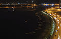 Night view of the boats docked to the east shoreline of Al Khan Lagoon.