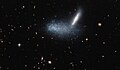 La galaxia enana irregular PGC 16389 cubre a la galaxia vecina APMBGC 252+125-117.[16]​