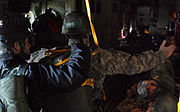 A Ranger from the 2nd Ranger Battalion instructs fellow soldiers in a Jump Master course at Joint Base Lewis-McChord, 13 April 2004