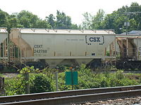 a two-bay through-sill CSX covered hopper