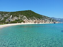 Cala Luna [it] in the Province of Nuoro in Sardinia was the location of Andrea's postcard.