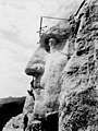 Image 7 Construction of Mount Rushmore Photo credit: Rise Studio The construction of Mount Rushmore, a United States National Monument depicting the heads of four U.S. Presidents carved into the Black Hills of South Dakota, began on August 10, 1927, with the bust of George Washington. This first phase was completed in seven years (partial completion in 1932 shown here), culminating in its unveiling in 1934. The remaining three heads—Thomas Jefferson, Abraham Lincoln, and Theodore Roosevelt—took only an additional seven years to complete. More selected pictures