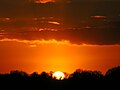 Zonsondergang vanaf het observatiedek van vliegveld Eelde