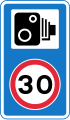 Speed camera ahead with reminder of 30 mph (48 km/h) speed limit