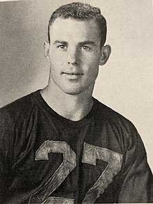 Black and white photograph of Don Doll in an unidentified jersey. The jersey has the number 27 on it and he's shown from about the waist up.