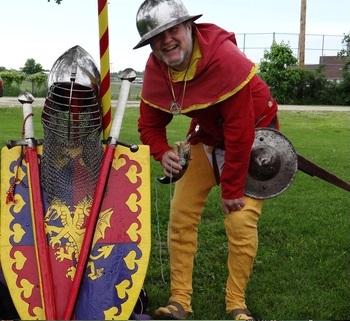 Man posing for camera in medieval attire