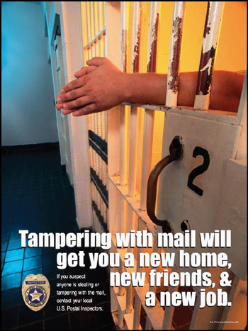 Person extending hands through jail cell bars