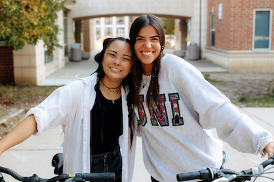 Students biking on campus