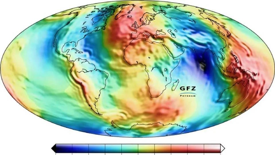 Global geoid map with colorful variations representing differences in Earth's gravity field. The scale ranges from -100 (low) to 100 (high). Europe's position is central.