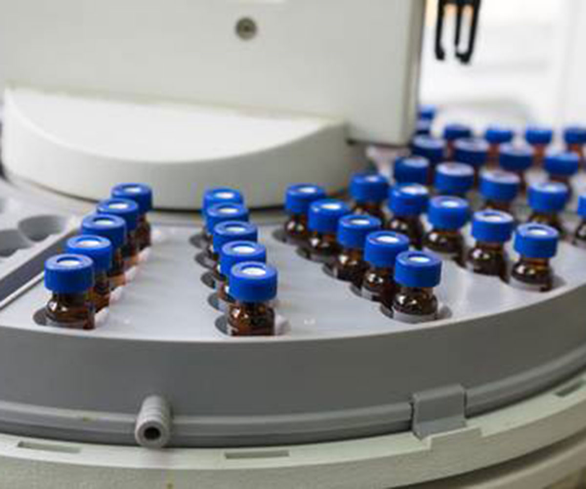 oil bottles in a lab being tested