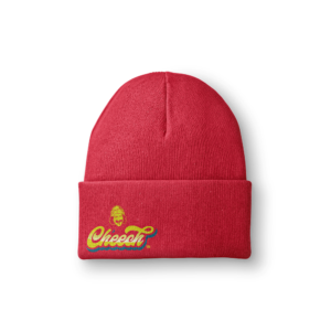 A red beanie with a logo featuring a small caricature and the word 