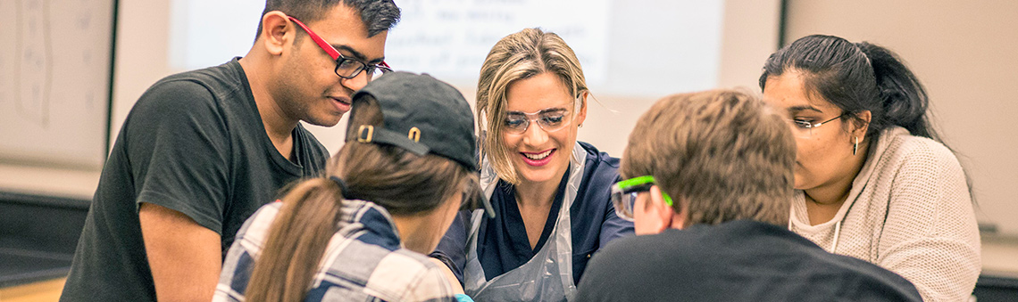 faculty member assisting students