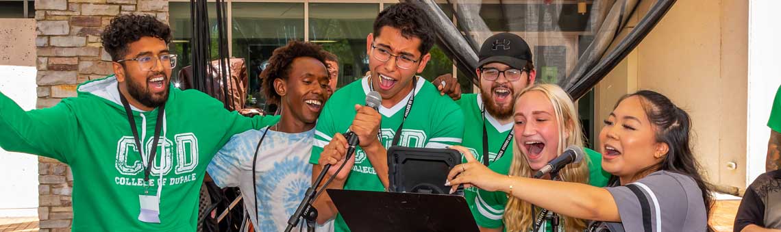 students singing karaoke