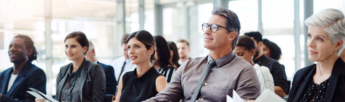 Business professionals looking at presentation