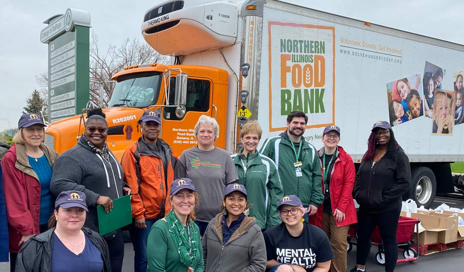 Food bank volunteers outside on campus