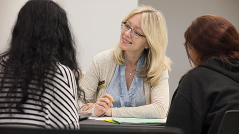 Students meeting with an advisor