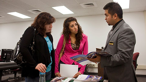 Students talking to an advisor