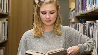 Students reading a book