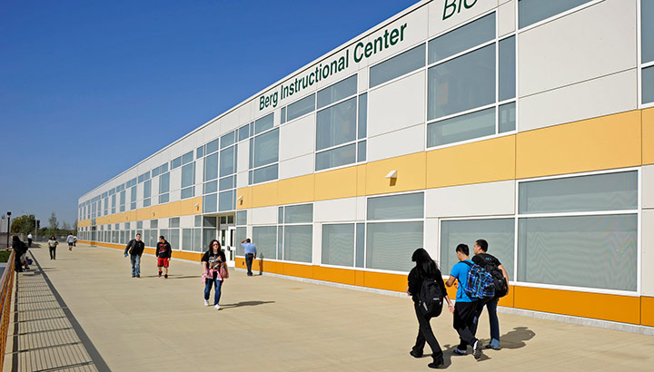 Berg Instruction Center with students walking in front of