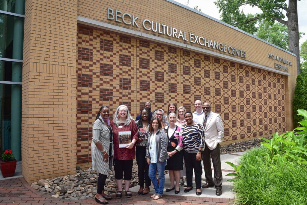 UTCSW group photo of senior administrative team in front of the Beck Cultural Center