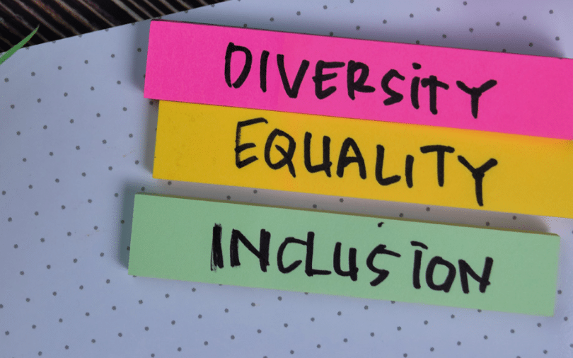 papers with diversity, equity, and inclusion written on them