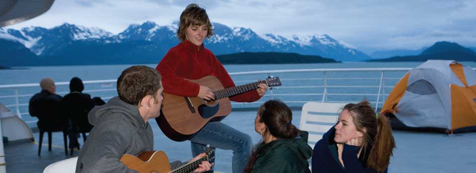 Passengers relax on the Solarium of the MV Malaspina © Brian Adams / Alaska Marine Highway System