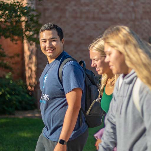 Students walking on DSU's campus.