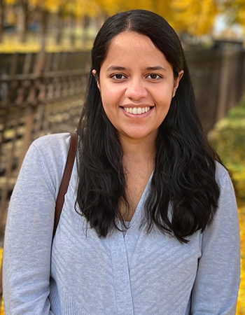 A woman outside a park